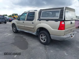 2005 Ford Explorer Sport Trac XLS z VIN 1FMZU67K85UA94565, wystawiony jako IAAI lot #42172948 z przebiegiem 173 517 mil mil oraz . Historia ofert i sprzedaży dostępna na DreamBid. Obrazek 3.
