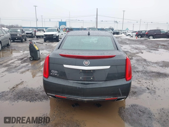2013 Cadillac XTS Luxury z VIN 2G61R5S35D9100771, wystawiony jako IAAI lot #41673766 z przebiegiem 41 123 mil mil oraz . Historia ofert i sprzedaży dostępna na DreamBid. Obrazek 16.