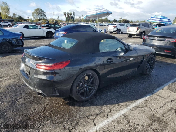 2020 BMW Z4 sDriveM40i with VIN WBAHF9C02LWW55809, listed as a Copart auction lot 48812855 with 39,680 mi miles and Salvage Title. Bid and sale history available at carsss.com. Image 3.