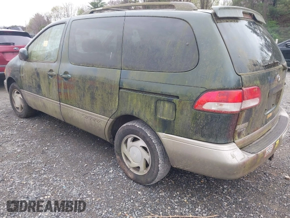 2001 Toyota Sienna LE with VIN 4T3ZF13C71U351289, listed as a IAAI auction lot 41966579 with 254,740 mi miles. Bid and sale history available at carsss.com. Image 3.