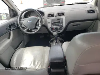 2007 Ford Focus S z VIN 1FAHP37N47W245222, wystawiony jako Copart lot #57293025 z przebiegiem 102 552 mil mil oraz Szkoda całkowita • Salvage title. Historia ofert i sprzedaży dostępna na DreamBid. Obrazek 8.