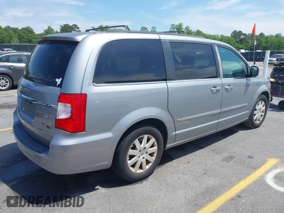 2014 Chrysler Town & Country Touring with VIN 2C4RC1BG7ER271455, listed as a IAAI auction lot 42102571 with 140,578 mi miles. Bid and sale history available at carsss.com. Image 4.
