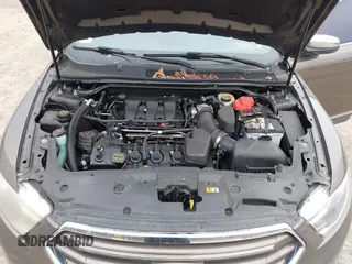 2015 Ford Taurus Limited with VIN 1FAHP2J84FG110702, listed as a IAAI auction lot 42060437 with 208,012 mi miles. Bid and sale history available at carsss.com. Image 10.