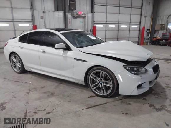 2014 BMW 6 Series 650i xDrive z VIN WBA6B4C55ED371378, wystawiony jako IAAI lot #41640888 z przebiegiem 80 927 mil mil oraz . Historia ofert i sprzedaży dostępna na DreamBid. Obrazek 1.
