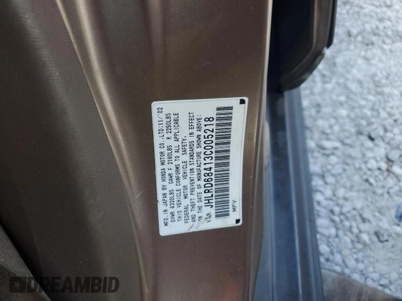 2003 Honda CR-V LX z VIN JHLRD68413C005218, wystawiony jako Copart lot #56750145 z przebiegiem 148 950 mil mil oraz Szkoda całkowita • Salvage title. Historia ofert i sprzedaży dostępna na DreamBid. Obrazek 13.