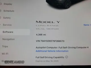 2025 Tesla Model Y Long Range z VIN 7SAYGDEE7SF288570, wystawiony jako Copart lot #48596345 z przebiegiem 4 366 mil mil oraz Szkoda całkowita • Salvage title. Historia ofert i sprzedaży dostępna na DreamBid. Obrazek 9.