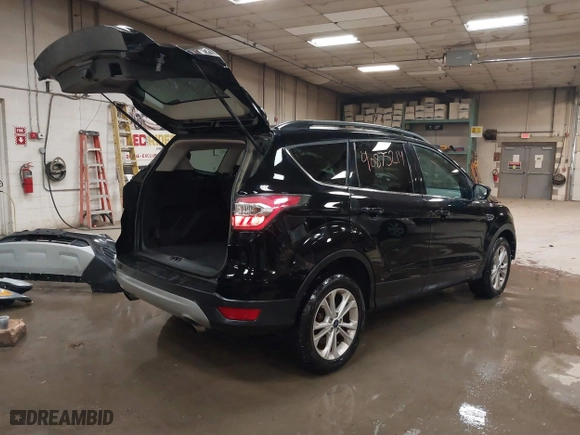 2017 Ford Escape SE with VIN 1FMCU9GDXHUA07522, listed as a IAAI auction lot 40875214 with 114,175 mi miles. Bid and sale history available at carsss.com. Image 4.