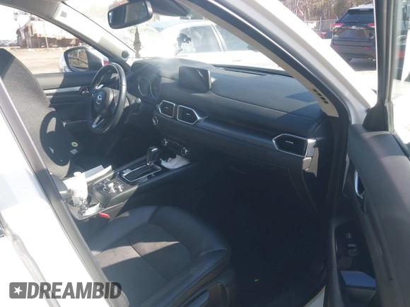2017 Mazda CX-5 Touring z VIN JM3KFBCL8H0214052, wystawiony jako IAAI lot #41940783 z przebiegiem 120 083 mil mil oraz . Historia ofert i sprzedaży dostępna na DreamBid. Obrazek 5.
