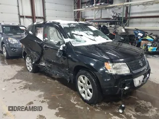 2010 Suzuki Grand Vitara z VIN JS3TD1D94A4100405, wystawiony jako IAAI lot #41567866 z przebiegiem 127 348 mil mil oraz . Historia ofert i sprzedaży dostępna na DreamBid. Obrazek 1.