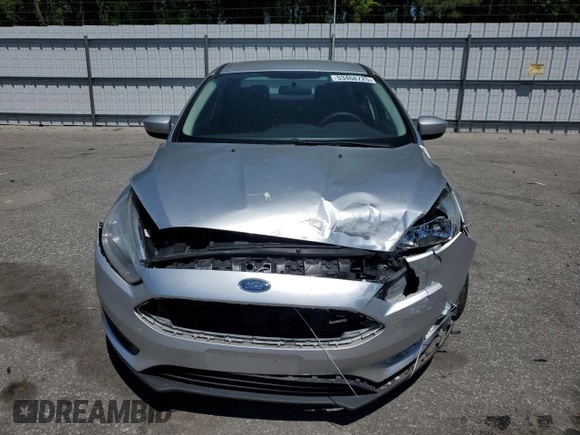 2018 Ford Focus SE with VIN 1FADP3FE0JL202442, listed as a Copart auction lot 53468725 with 106,119 mi miles and Salvage title. Bid and sale history available at DreamBid. Image 5.