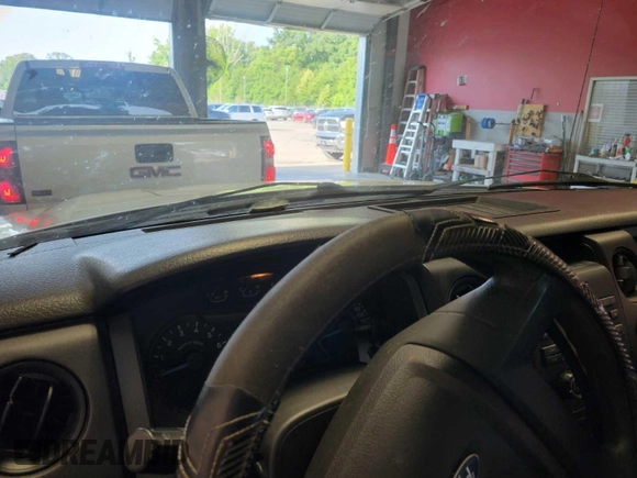 2014 Ford F-150 XL with VIN 1FTMF1CM6EKD62026, listed as a IAAI auction lot 42812805 with 143,144 mi miles and . Bid and sale history available at DreamBid. Image 14.