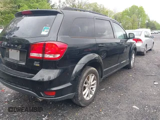 2016 Dodge Journey SXT with VIN 3C4PDCBG2GT100550, listed as a IAAI auction lot 41982670 with 184,601 mi miles. Bid and sale history available at carsss.com. Image 4.