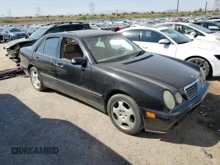 2001 Mercedes-Benz E-Class AWD with VIN WDBJF83J31X058259, listed as a Copart auction lot 74370604 with 131,454 mi miles and Clean Title. Bid and sale history available at carsss.com. Image 4.