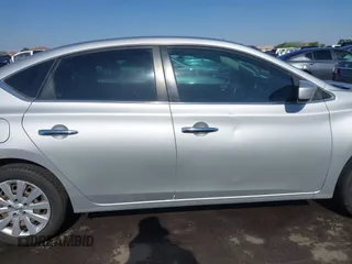 2017 Nissan Sentra S z VIN 3N1AB7AP9HY277592, wystawiony jako IAAI lot #42287903 z przebiegiem 186 876 mil mil oraz . Historia ofert i sprzedaży dostępna na DreamBid. Obrazek 14.