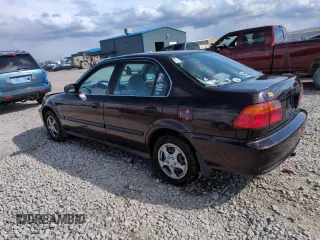 2000 Honda Civic LX with VIN 1HGEJ6673YL047996, listed as a Copart auction lot 51451505 with 216,329 mi miles and Clean Title. Bid and sale history available at DreamBid. Image 2.