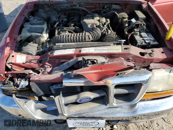 2000 Ford Ranger XLT z VIN 1FTZR15X9YPA91426, wystawiony jako Copart lot #52104665 z przebiegiem 182 145 mil mil oraz Szkoda całkowita • Salvage title. Historia ofert i sprzedaży dostępna na DreamBid. Obrazek 11.