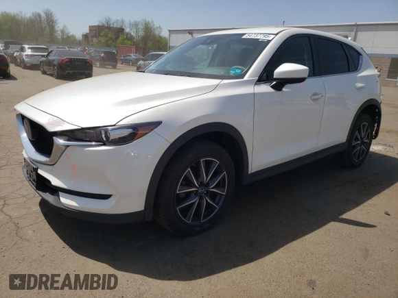 2018 Mazda CX-5 Touring with VIN JM3KFBCMXJ0389773, listed as a Copart auction lot 54737795 with 82,103 mi miles and Salvage Title. Bid and sale history available at DreamBid. Image 1.