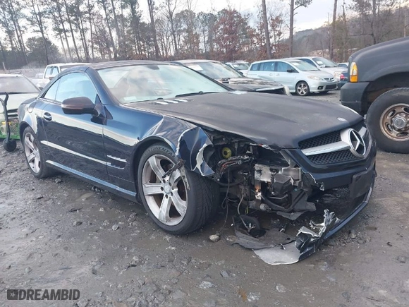 2009 Mercedes-Benz SL-Class V8 with VIN WDBSK71F29F143653, listed as a IAAI auction lot 41310556 with 115,377 mi miles. Bid and sale history available at carsss.com. Image 1.
