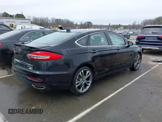 2019 Ford Fusion Titanium with VIN 3FA6P0K93KR243148, listed as a IAAI auction lot 41757469 with 78,859 mi miles. Bid and sale history available at carsss.com. Image 4.