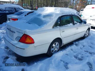 2001 Toyota Avalon XL z VIN 4T1BF28B31U159772, wystawiony jako IAAI lot #41622587 z przebiegiem 175 456 mil mil oraz . Historia ofert i sprzedaży dostępna na DreamBid. Obrazek 4.