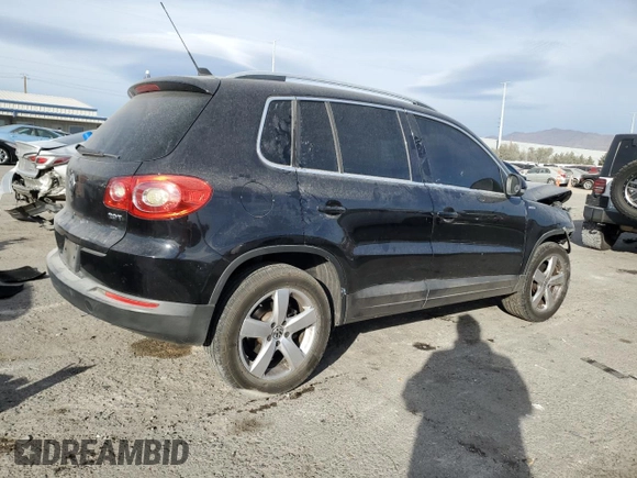 2010 Volkswagen Tiguan Wolfsburg Edition with VIN WVGAV7AX5AW002900, listed as a Copart auction lot 86214514 with 153,645 mi miles and Salvage title. Bid and sale history available at DreamBid. Image 3.