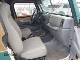1997 Jeep Wrangler SE with VIN 1J4FY29P1VP408966, listed as a IAAI auction lot 41683640 with 106,910 mi miles. Bid and sale history available at carsss.com. Image 5.