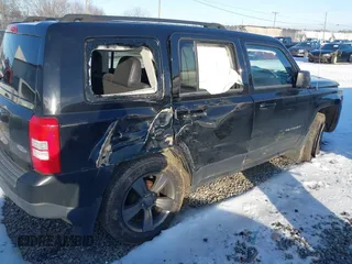 2014 Jeep Patriot Latitude with VIN 1C4NJPFAXED681859, listed as a IAAI auction lot 41271373 with 173,529 mi miles and . Bid and sale history available at DreamBid. Image 4.