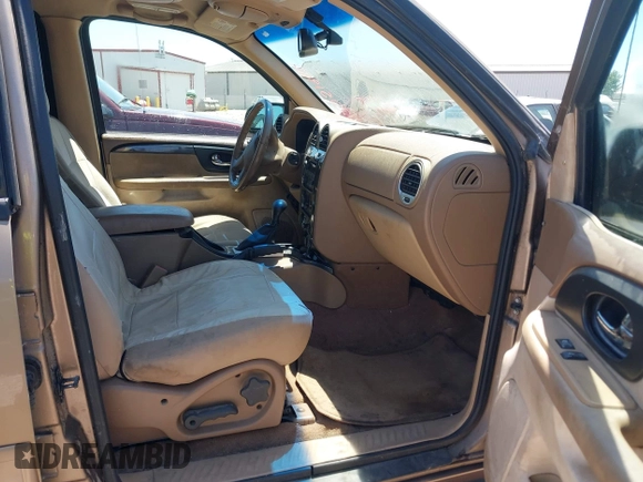 2003 GMC Envoy SLT with VIN 1GKDS13S432246741, listed as a IAAI auction lot 42051902 with 344,691 mi miles and . Bid and sale history available at DreamBid. Image 5.