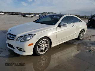 2011 Mercedes-Benz E-Class E 550 with VIN WDDKJ7CBXBF077136, listed as a Copart auction lot 83542054 with 125,274 mi miles and Salvage Title. Bid and sale history available at carsss.com. Image 1.