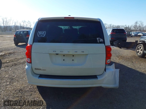 2019 Dodge Grand Caravan SE with VIN 2C4RDGBG2KR799660, listed as a IAAI auction lot 41898556 with 104,642 mi miles and . Bid and sale history available at DreamBid. Image 17.