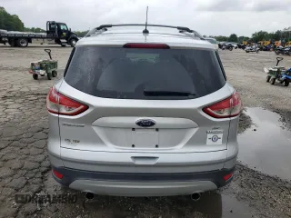 2013 Ford Escape SE with VIN 1FMCU0GX7DUA57262, listed as a Copart auction lot 59088705 with 157,201 mi miles and Salvage title. Bid and sale history available at DreamBid. Image 6.