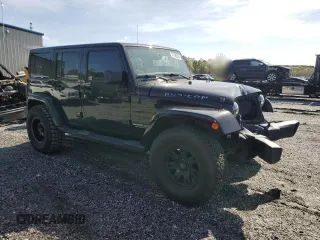 2016 Jeep Wrangler Unlimited Rubicon with VIN 1C4BJWFG8GL226020, listed as a Copart auction lot 51225955 with 103,770 mi miles and Clean Title. Bid and sale history available at carsss.com. Image 4.