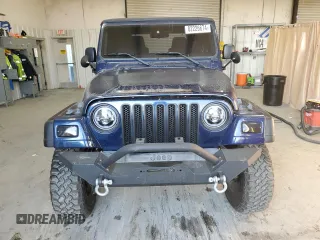 2006 Jeep Wrangler SE with VIN 1J4FA29126P705827, listed as a Copart auction lot 82226674 with 165,632 mi miles and Salvage Title. Bid and sale history available at carsss.com. Image 5.
