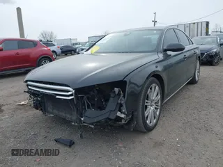 2012 Audi A8 с VIN WAUAVAFD0CN035731, выставлен на аукционе IAAI как лот 41286022 с пробегом 82 835 миль миль и . История ставок и продаж доступна на DreamBid. Изображение 20.
