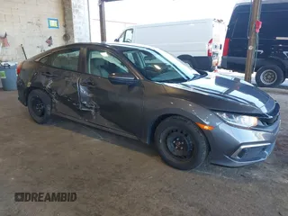 2020 Honda Civic LX z VIN 2HGFC2F66LH554007, wystawiony jako IAAI lot #41859115 z przebiegiem 70 386 mil mil oraz . Historia ofert i sprzedaży dostępna na DreamBid. Obrazek 1.