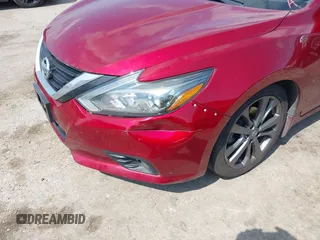 2018 Nissan Altima SR with VIN 1N4AL3AP9JC195613, listed as a IAAI auction lot 42131986 with 83,256 mi miles and . Bid and sale history available at carsss.com. Image 6.
