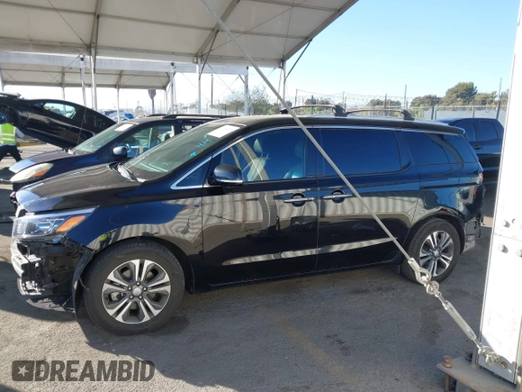 2021 Kia Sedona EX with VIN KNDMC5C10M6671729, listed as a IAAI auction lot 40858206 with 58,775 mi miles. Bid and sale history available at carsss.com. Image 15.