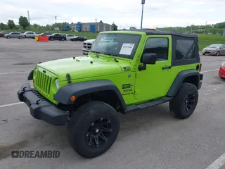 2013 Jeep Wrangler Sport with VIN 1C4AJWAG8DL507944, listed as a IAAI auction lot 42143144 with 70,085 mi miles and . Bid and sale history available at carsss.com. Image 2.
