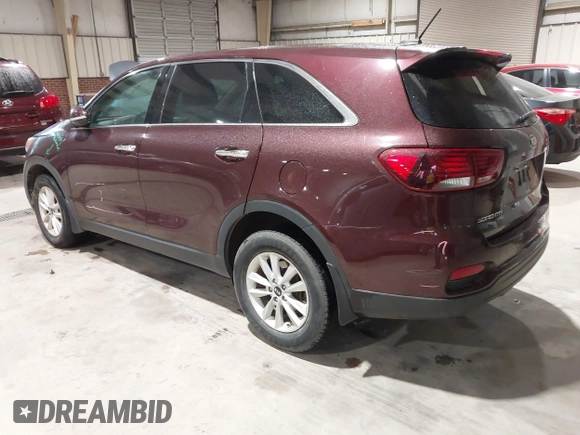 2019 Kia Sorento L with VIN 5XYPG4A34KG548624, listed as a IAAI auction lot 42020831 with 124,226 mi miles. Bid and sale history available at carsss.com. Image 3.