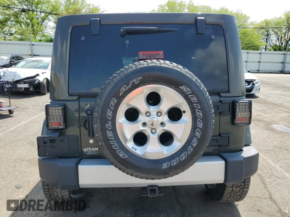 2015 Jeep Wrangler Unlimited Wrangler X with VIN 1C4BJWEG4FL754492, listed as a Copart auction lot 55305825 with 108,078 mi miles and Salvage title. Bid and sale history available at DreamBid. Image 6.
