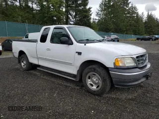 2003 Ford F-150 XL with VIN 1FTRX17L93NB69644, listed as a Copart auction lot 57130275 with 191,302 mi miles and Salvage title. Bid and sale history available at DreamBid. Image 4.