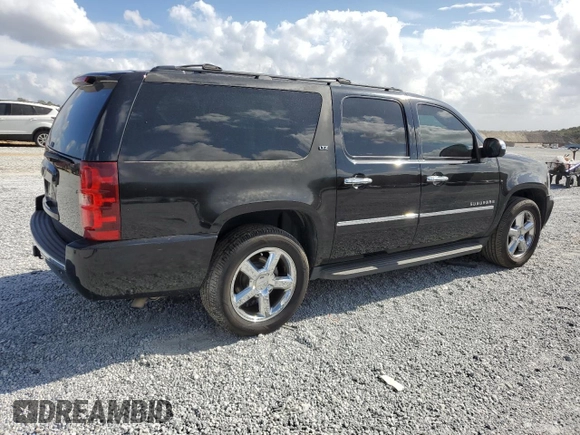 2013 Chevrolet Suburban LTZ with VIN 1GNSCKE0XDR364889, listed as a Copart auction lot 77598334 with 161,656 mi miles and Salvage Title. Bid and sale history available at carsss.com. Image 3.