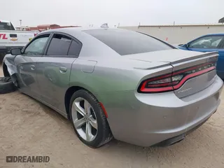 2018 Dodge Charger R/T with VIN 2C3CDXCTXJH148030, listed as a IAAI auction lot 41225873 with 105,069 mi miles. Bid and sale history available at carsss.com. Image 3.