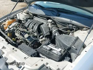 2002 Ford Taurus SE Standard z VIN 1FAFP53U32G169446, wystawiony jako IAAI lot #43205042 z przebiegiem 118 576 mil mil oraz . Historia ofert i sprzedaży dostępna na DreamBid. Obrazek 19.