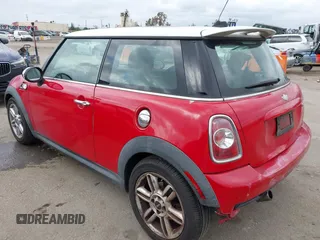 2013 MINI Hardtop S with VIN WMWSV3C55DT388301, listed as a IAAI auction lot 42058792 with 94,138 mi miles and . Bid and sale history available at DreamBid. Image 3.