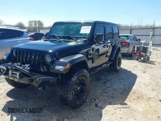 2020 Jeep Wrangler Unlimited Sport S z VIN 1C4HJXDN9LW323205, wystawiony jako IAAI lot #41879292 z przebiegiem 108 499 mil mil oraz . Historia ofert i sprzedaży dostępna na DreamBid. Obrazek 2.