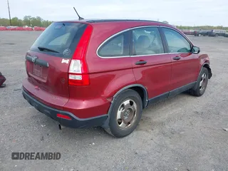2007 Honda CR-V LX with VIN JHLRE38327C040004, listed as a IAAI auction lot 42084244 with 271,363 mi miles. Bid and sale history available at carsss.com. Image 4.