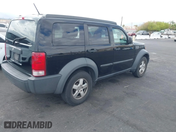 2007 Dodge Nitro SXT with VIN 1D8GT28K27W502900, listed as a IAAI auction lot 42077428 with 166,114 mi miles. Bid and sale history available at carsss.com. Image 4.