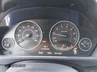 2016 BMW 4 Series 428i xDrive with VIN WBA4C9C5XGG135893, listed as a IAAI auction lot 41976541 with 86,987 mi miles and . Bid and sale history available at carsss.com. Image 7.