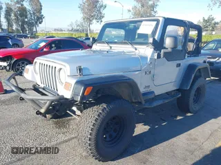 2005 Jeep Wrangler X with VIN 1J4FA39S55P348432, listed as a IAAI auction lot 41868451 with 166,876 mi miles. Bid and sale history available at carsss.com. Image 17.